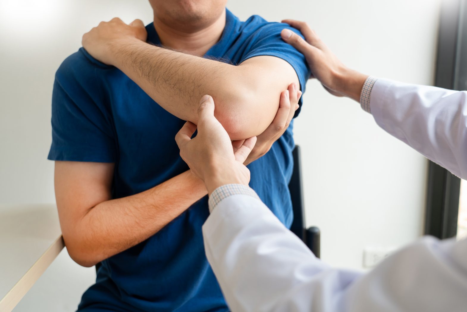 A person is being examined by a doctor.